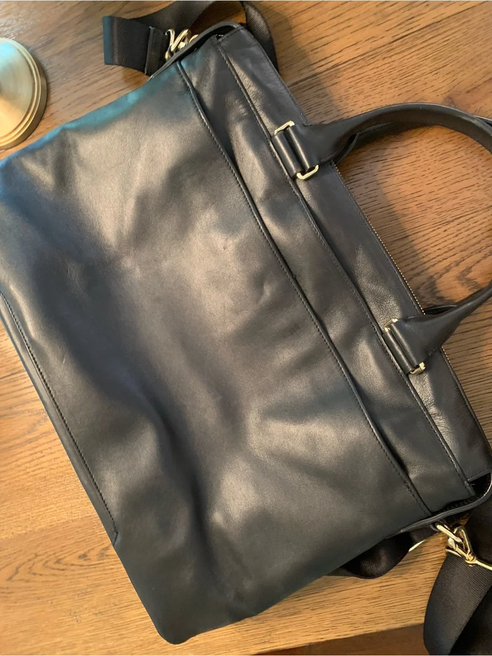 Tumi Women’s Black Leather Laptop Bag with Gold Hardware